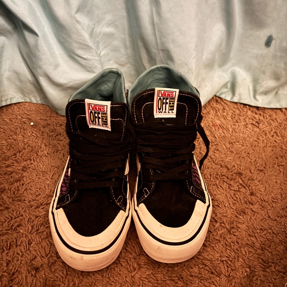Vans Black and White High-Top Sneakers